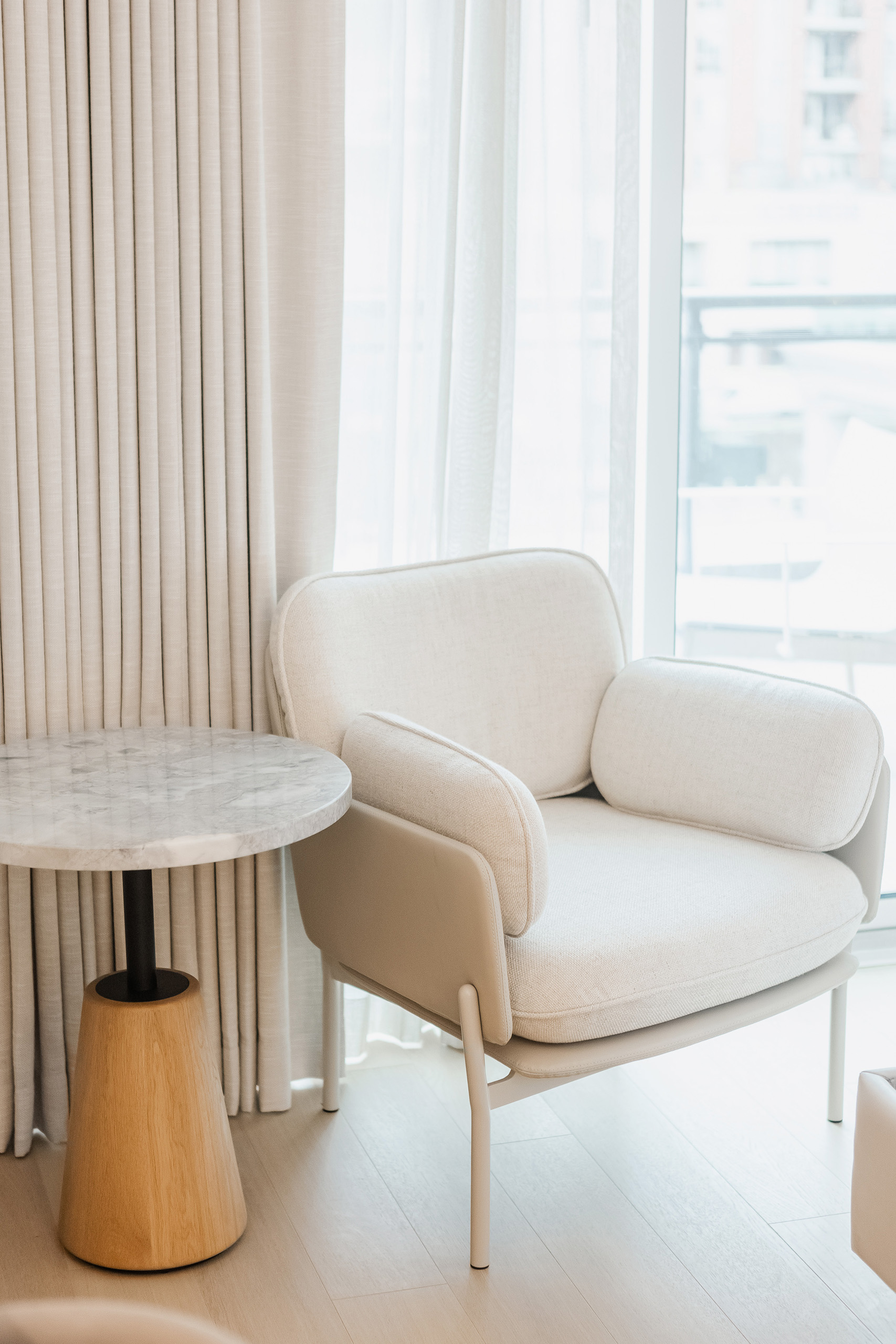 Modern white chair with side table