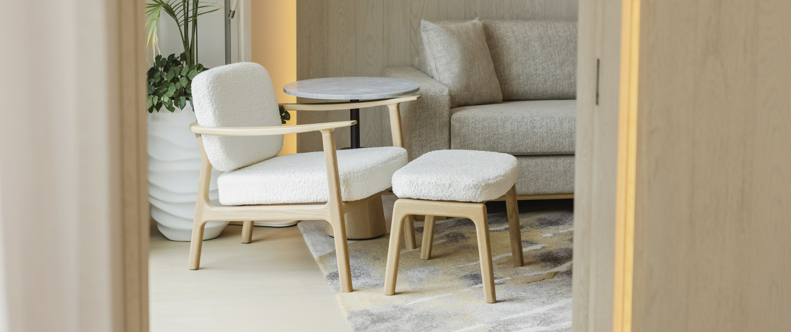 Beautiful, neutral and modern furniture in one of suites at The Pearle Hotel in Burlington Ontario