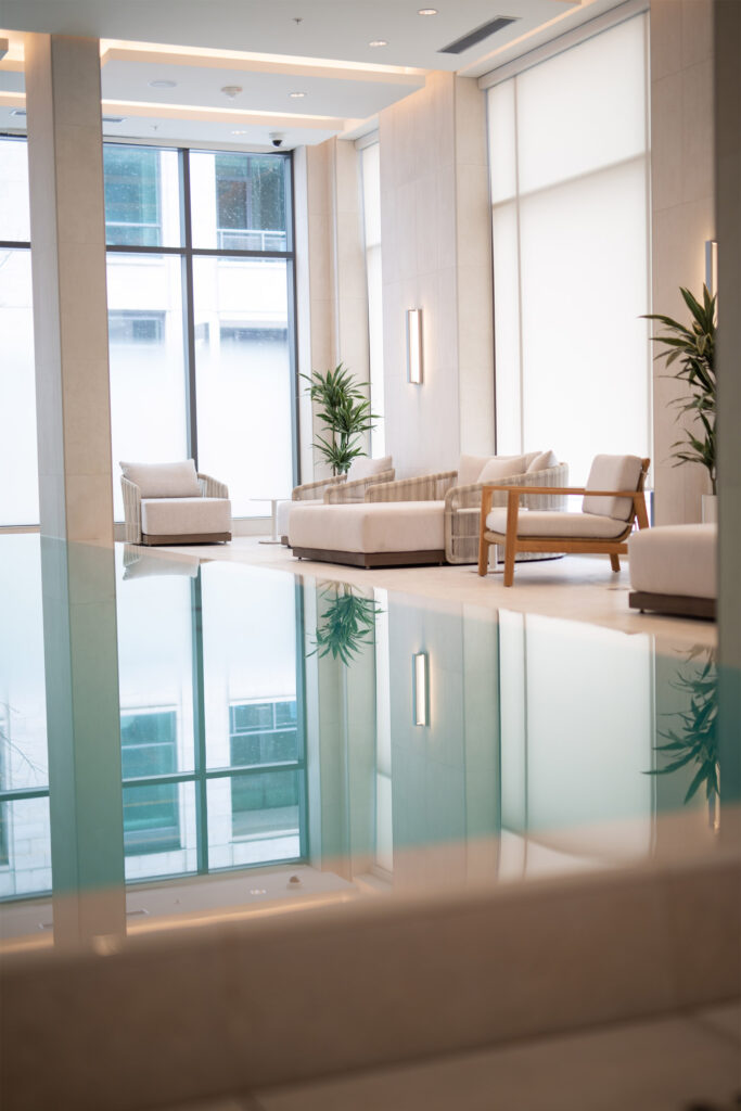 Poolside cabana-style lounge chairs at The Pearle Hotel