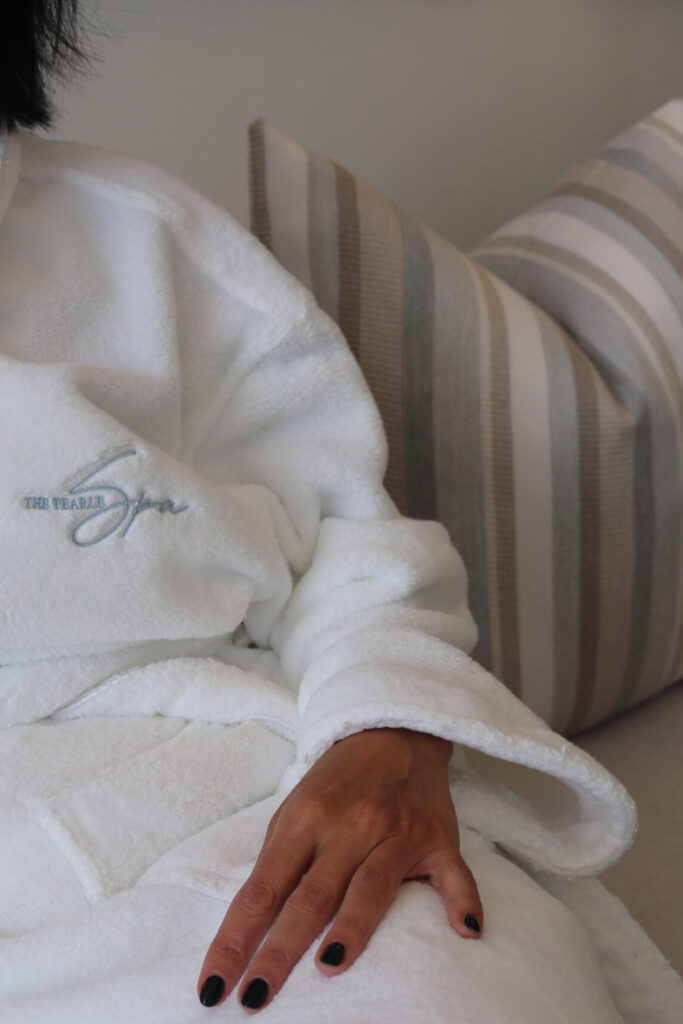 Guest in The Pearle Hotel & Spa robe at The Pearle Spa