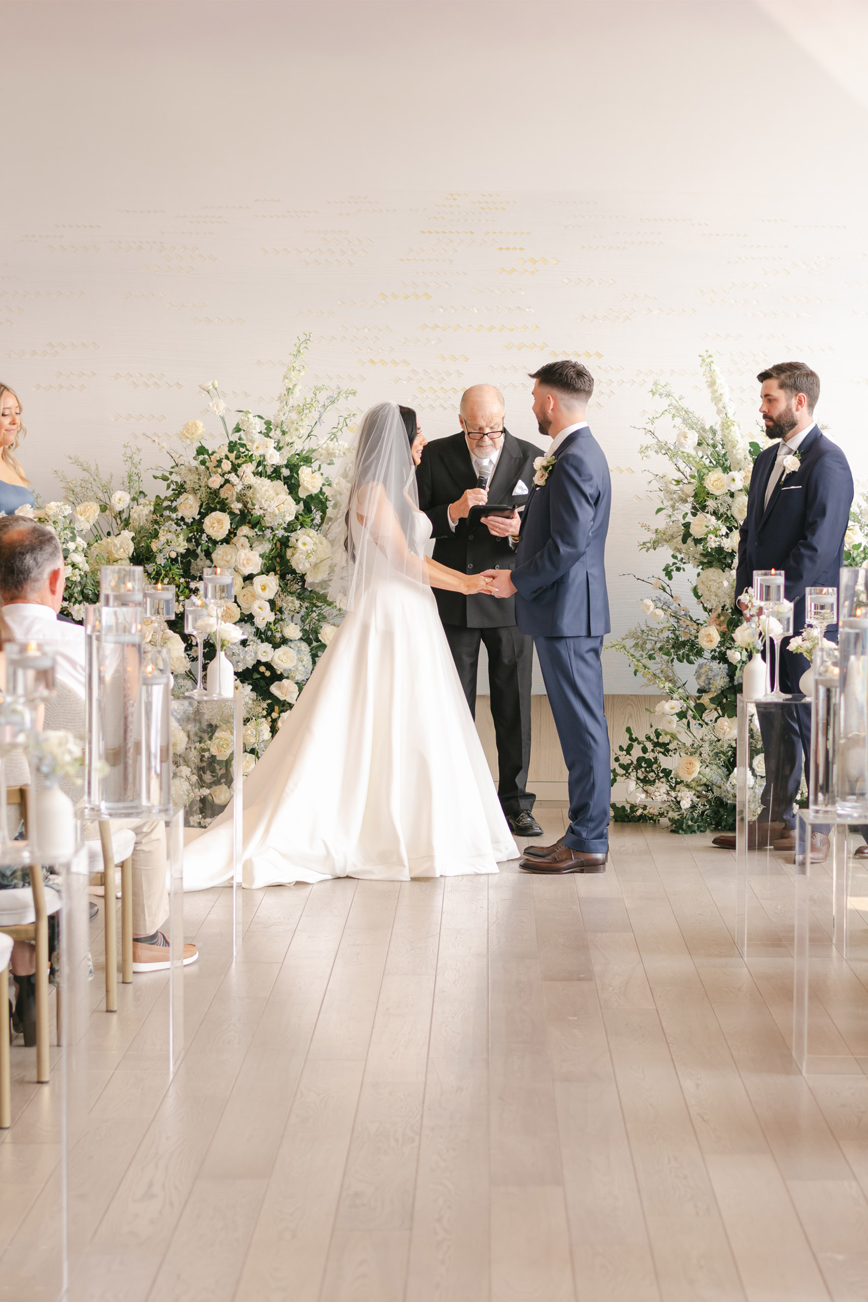 Bride and Groom saying their wedding vows at their wedding ceremony in The Pearle Hotel