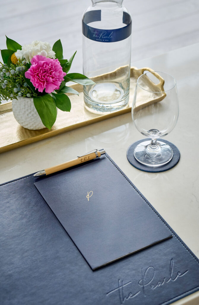 Close up of table setup for a corporate meeting at The Pearle Hotel